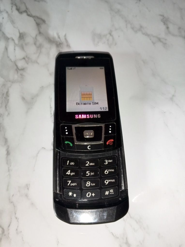 Телефон Samsung SGH-D900