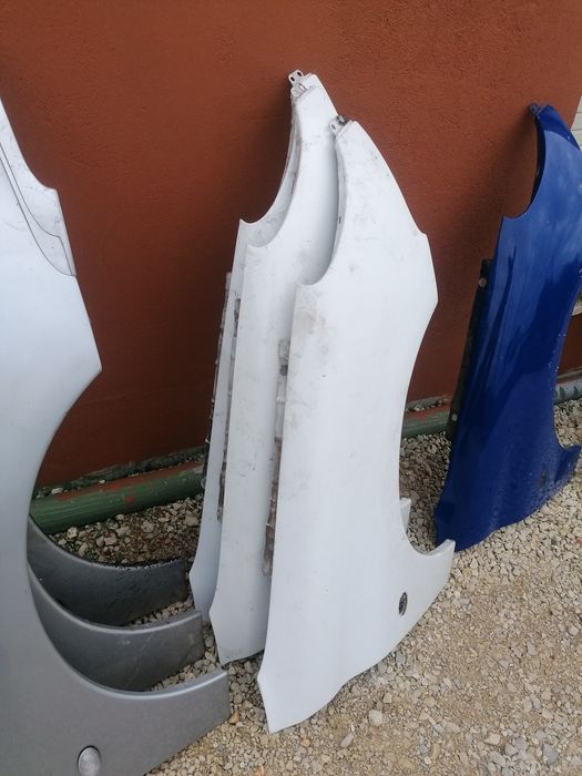 Guarda lamas peugeot 206