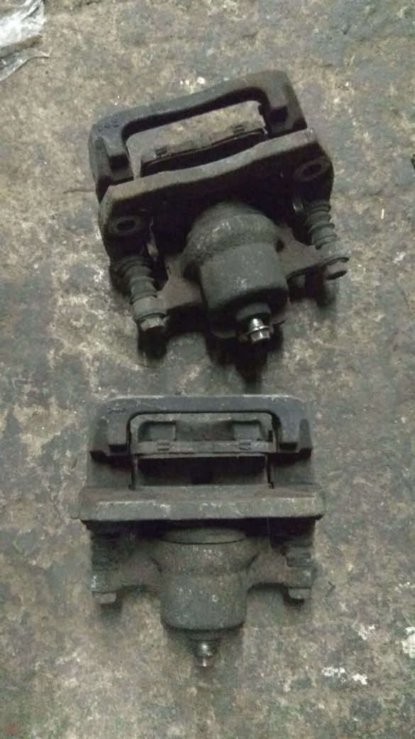 Суппорт Мазда СХ7 передний задний L/R L2Z6-26-98ZA / L2Z6-33-99ZA