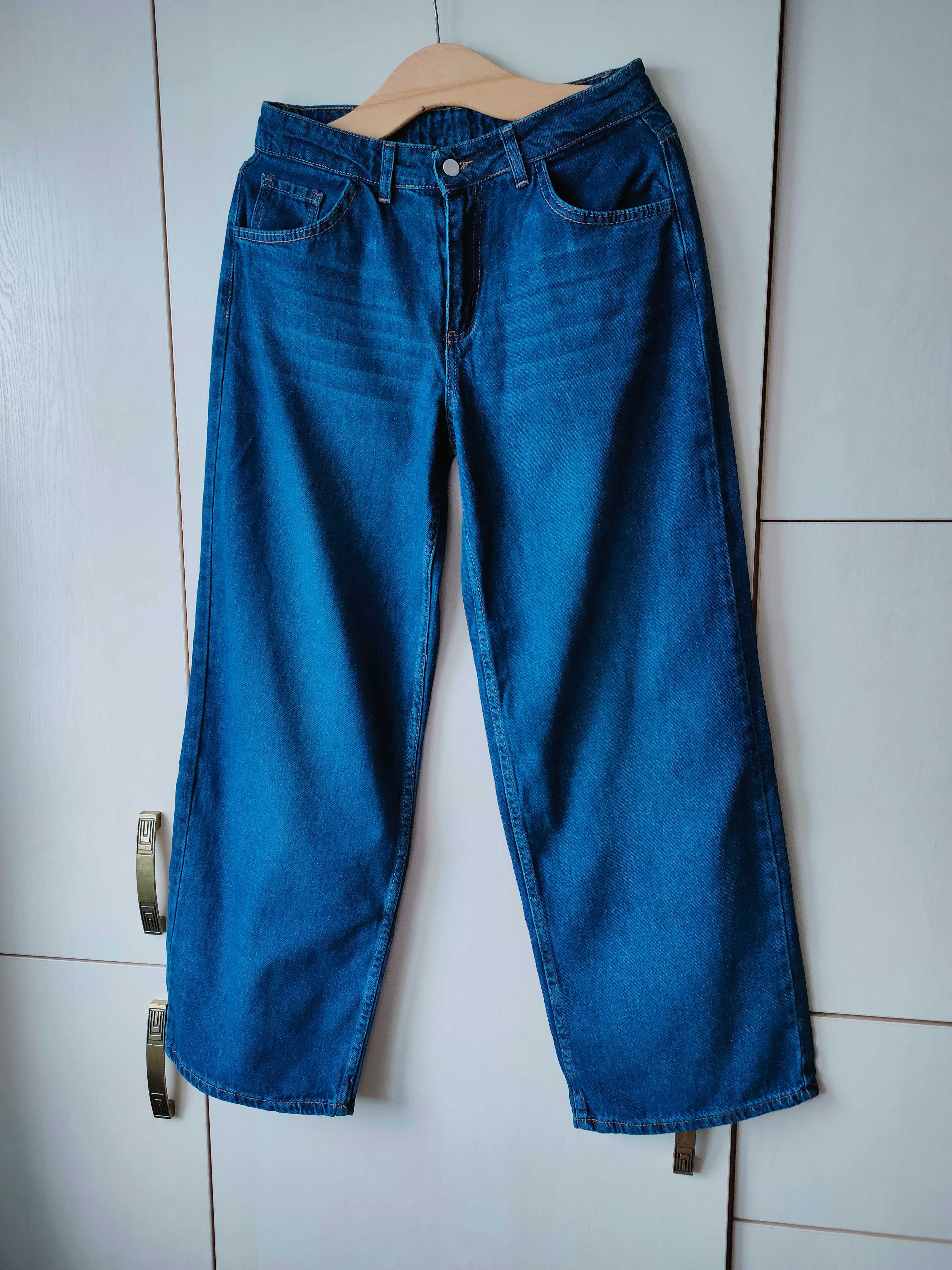 NOWE, niebieskie jeansy z przetarciami r. 40 (L)
