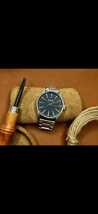 2 por 1! Relógio Nixon Sentry SS mais relógio Ego de oferta.