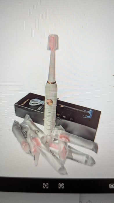 Електрична зубна щітка