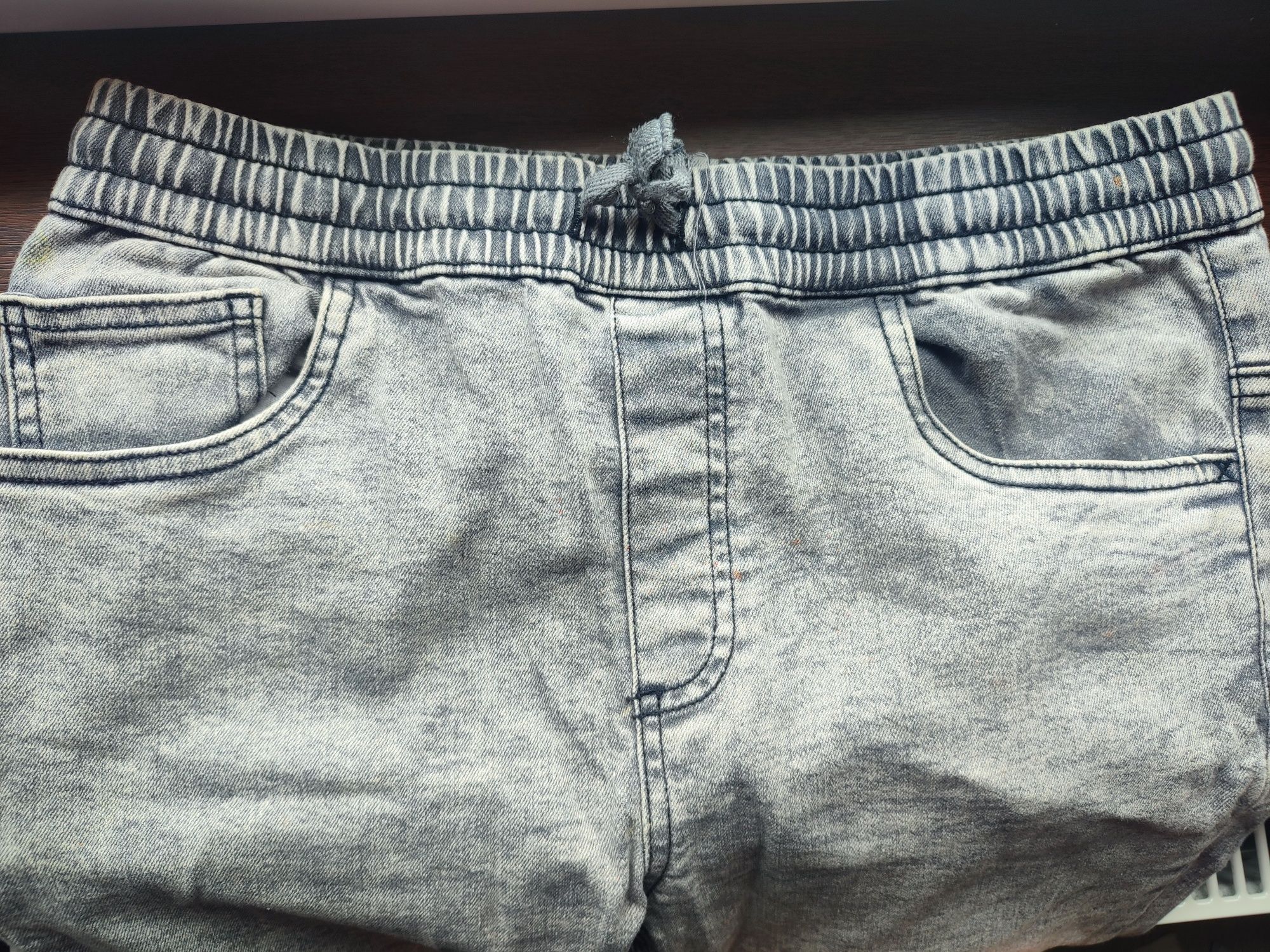 Spodnie damskie jeans szare Reserved 164