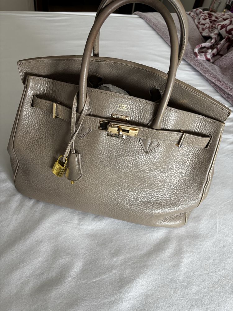 Mala Hermes com marcas