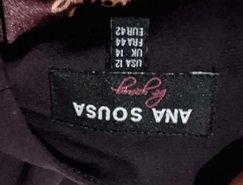 Vestido pelo joelho.