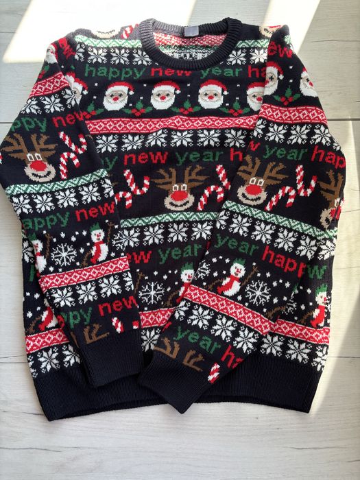 Новорічні світера від Defacto