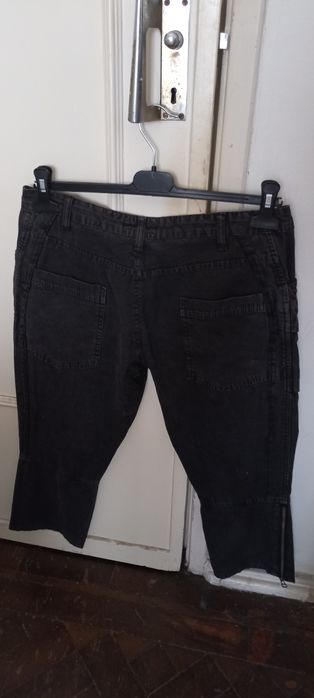 Calças pretas tipo pirata