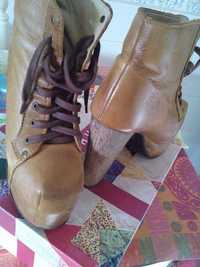 Botins/litas em pele novas