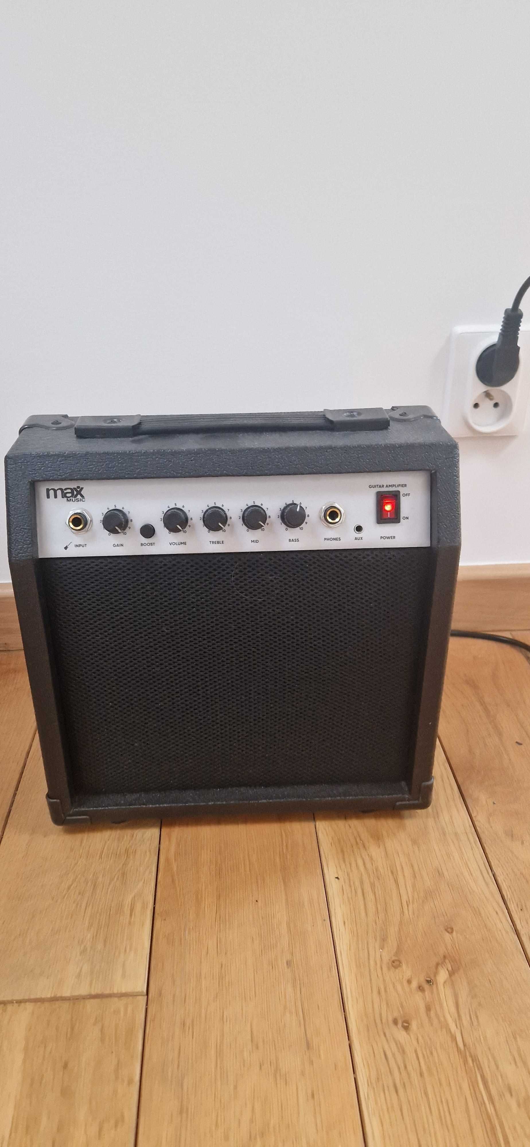 Gitara elektryczna, i wzmacniacz typu combo.