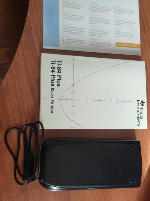 Calculadora gráfica TI-84 Plus com cabos e instruções