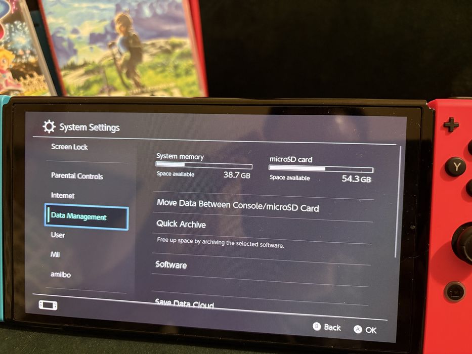 Nintendo Switch OLED gry Mario Kart, Zelda i etui
