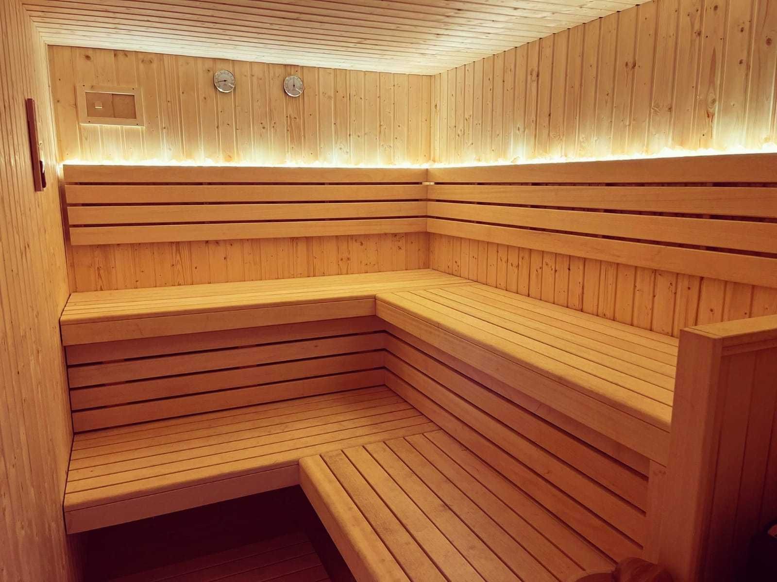 Domek z jacuzzi i sauną nad jeziorem Okuninka | J.Białe
