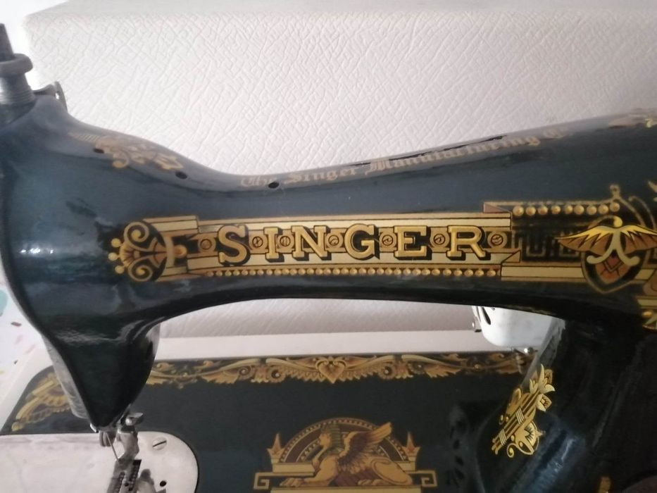 Máquina de costura singer