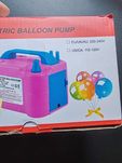 Máquina de encher balões