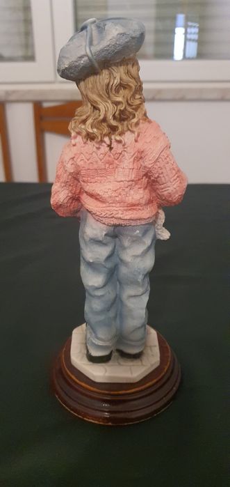 Vendo duas estatuetas antigas