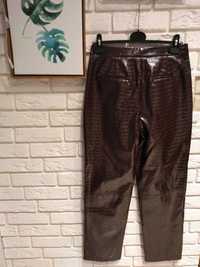 Skórzane spodnie z szerokimi nogawkami brązowe