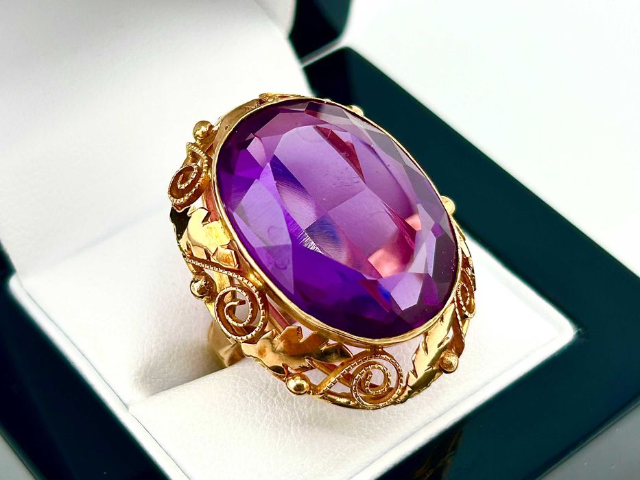 Złoty pierścionek z fioletowym oczkiem 13,52 g PR.585 14K R.17