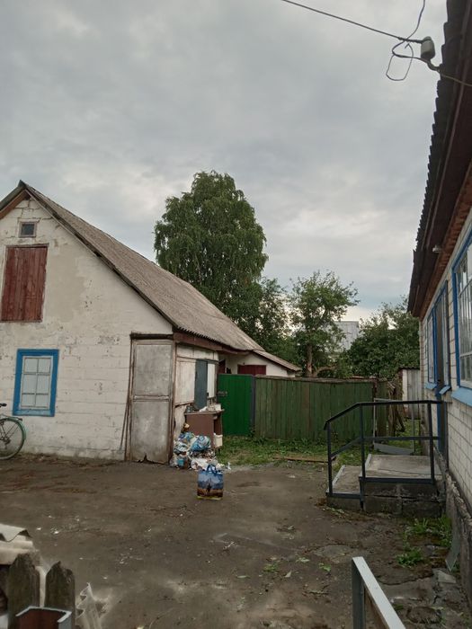 Будинок та земельна ділянка