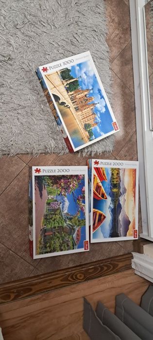 3 egzlemplatze puzzli marki TREFL.