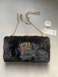 Clutch preta nova