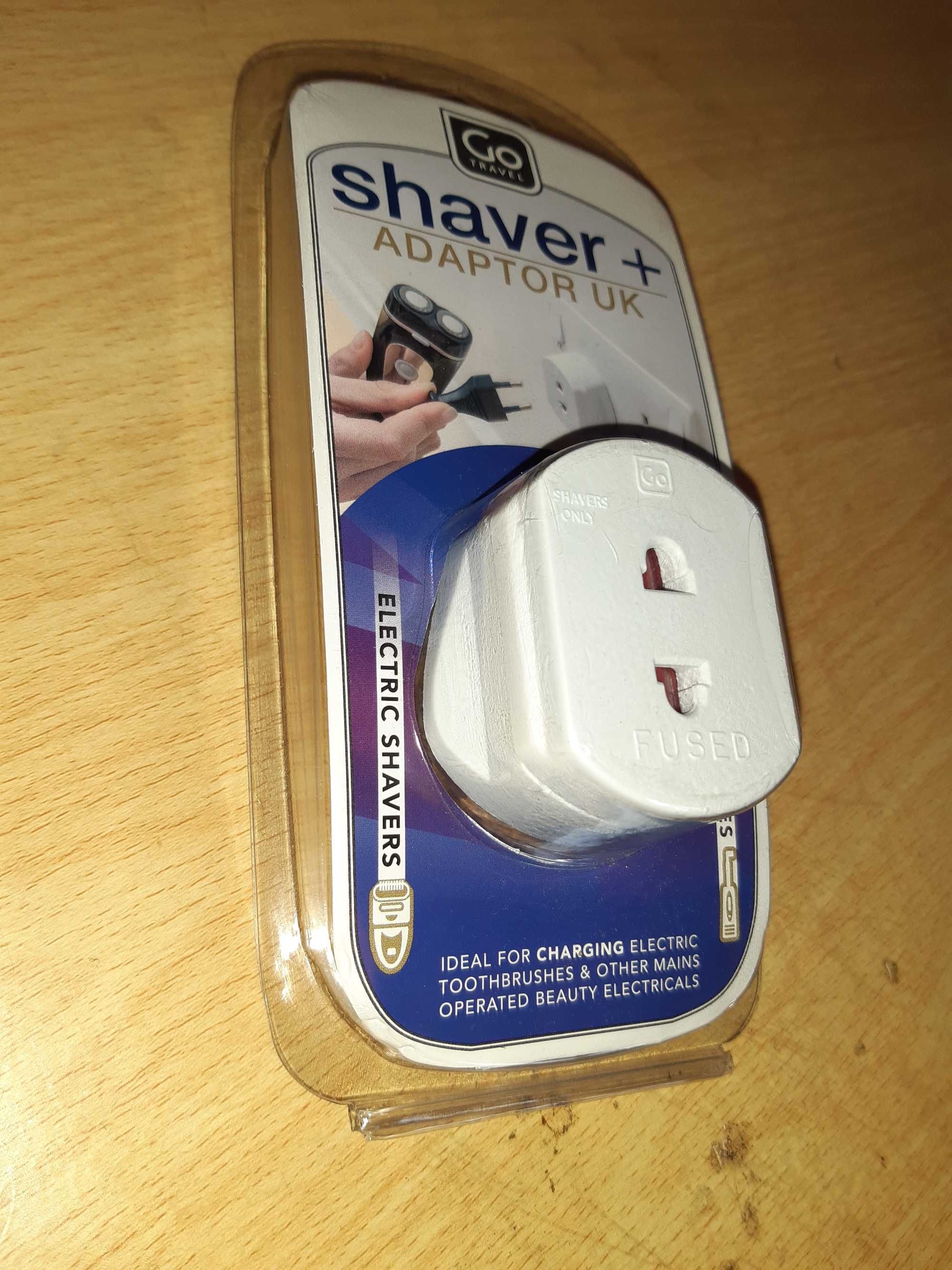 Adaptor / przejściówka/ prądu z EU do UK, nowy.