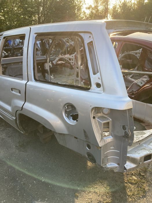 Чверть задня, крило до JEEP Grand Cherokee 2004 WJ - 5083111AF
