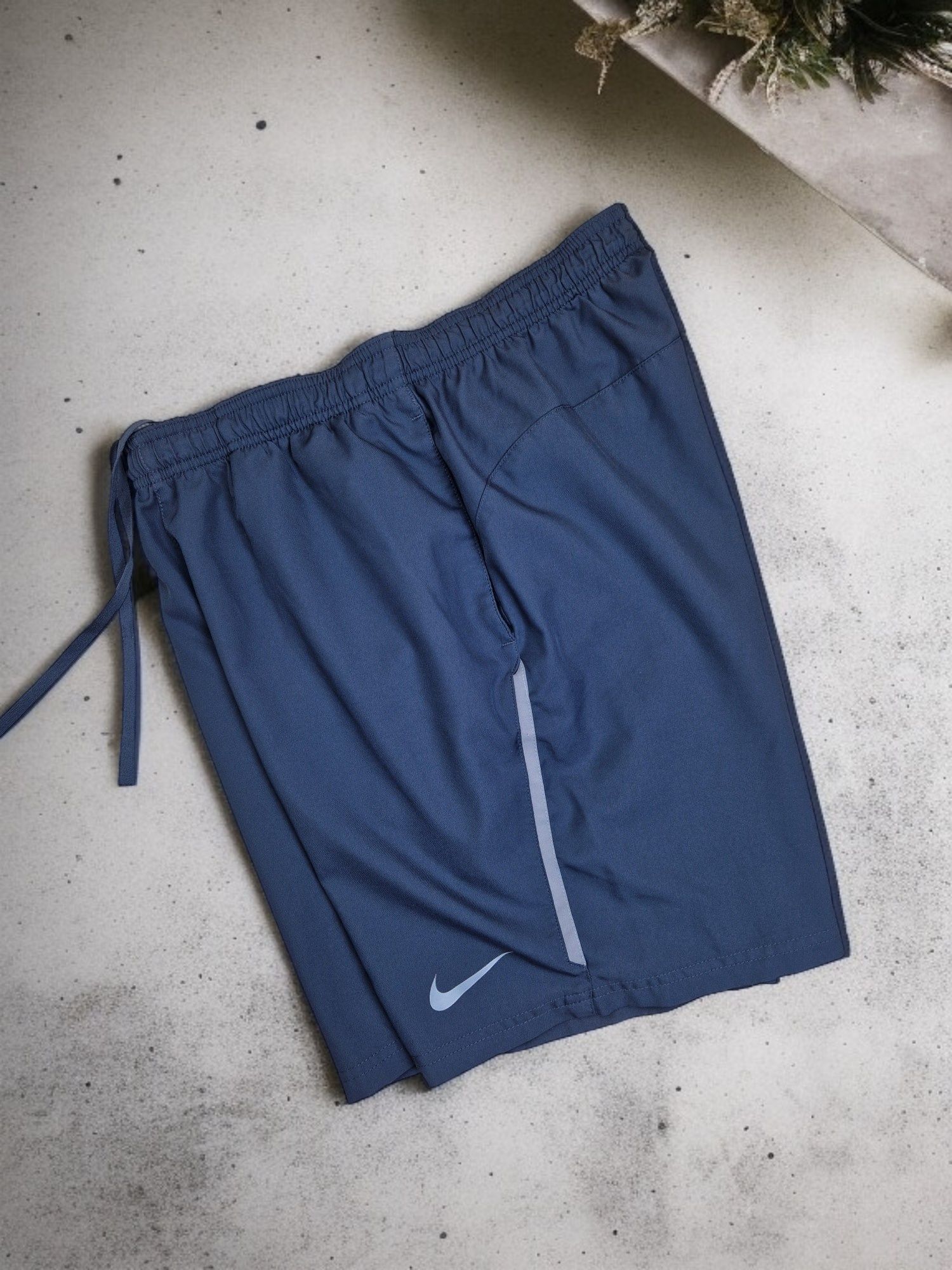 Шорти nike df running totality knit 9 flex