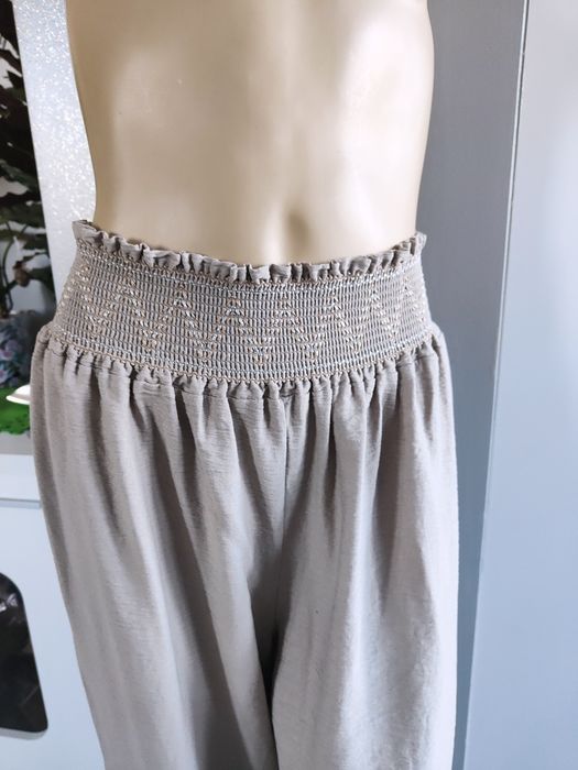 Nowe beżowe spodnie kuloty z szerokimi nogawkami wysoki stan 36 38