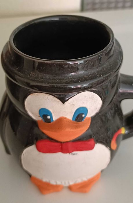 Pinguim caneca publicidade Penilan