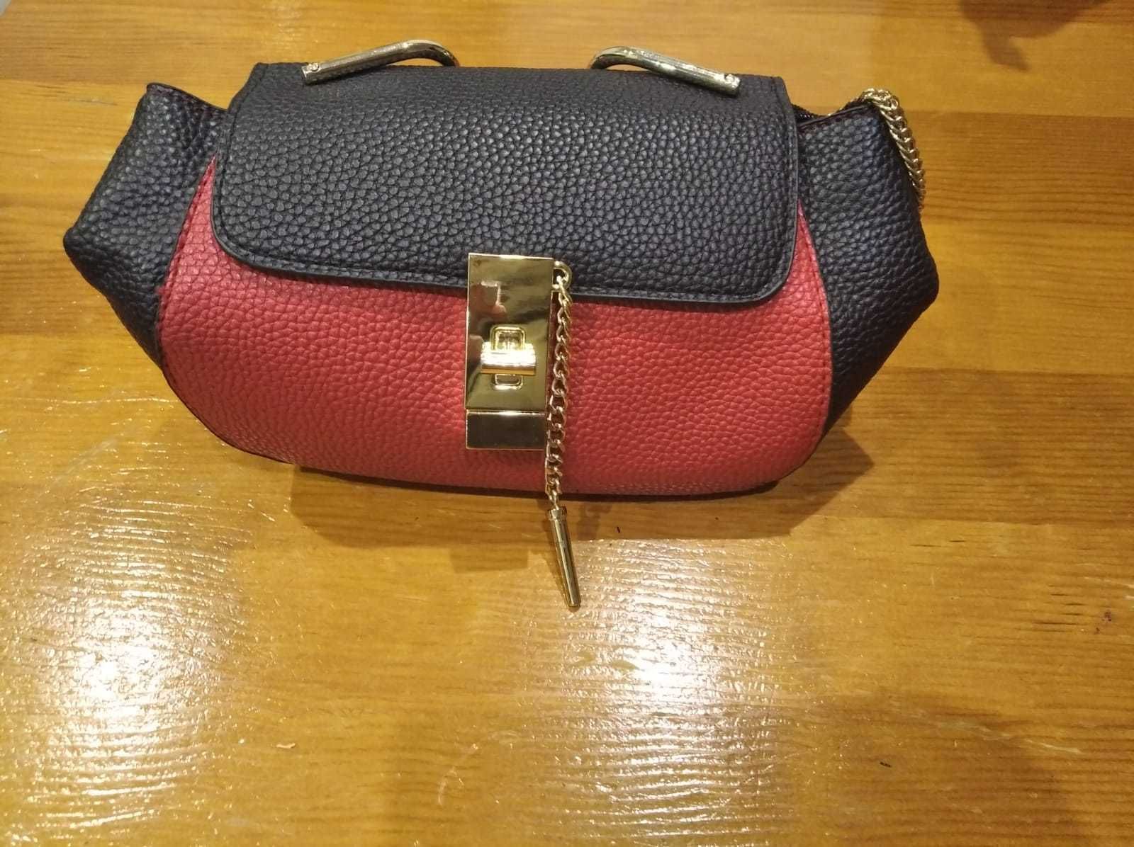 Mala Pequena com pegas douradas
