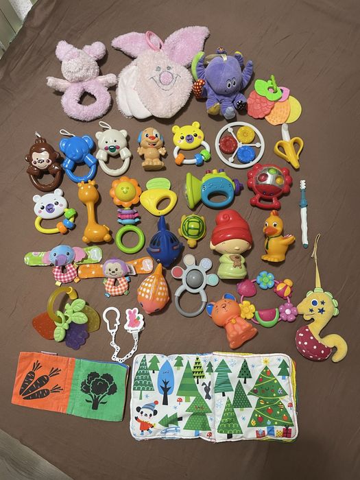 Іграшки для новонароджених. Гризунці. Брязкальця. Кліпса для соски.