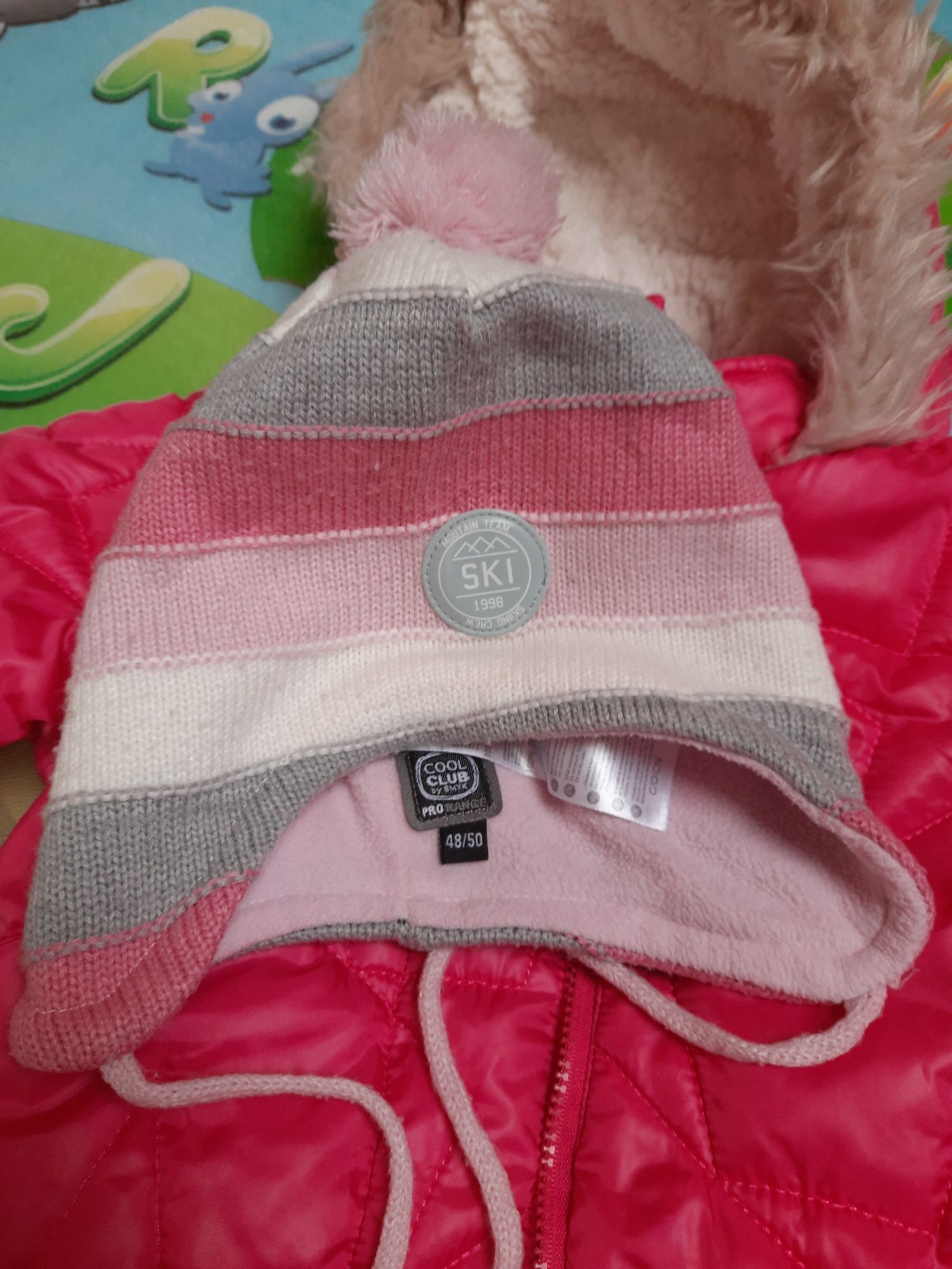 Kurtka zimowa dla dziewczynki rozmiar 80+ czapka