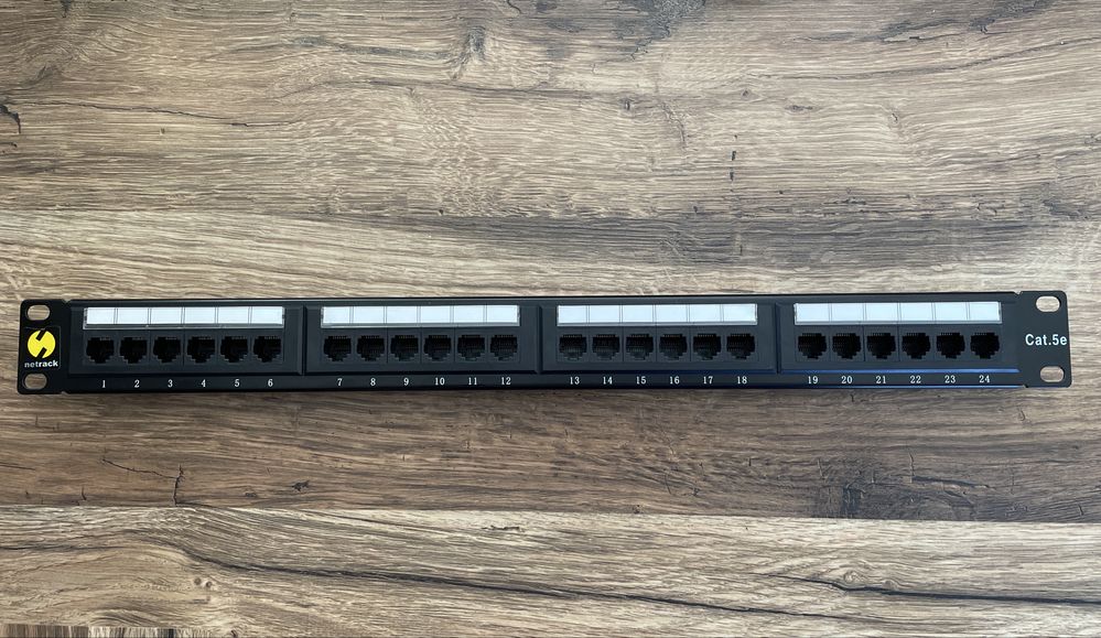 Patchpanel 24 port 1U UTP Cat. 5E netrack