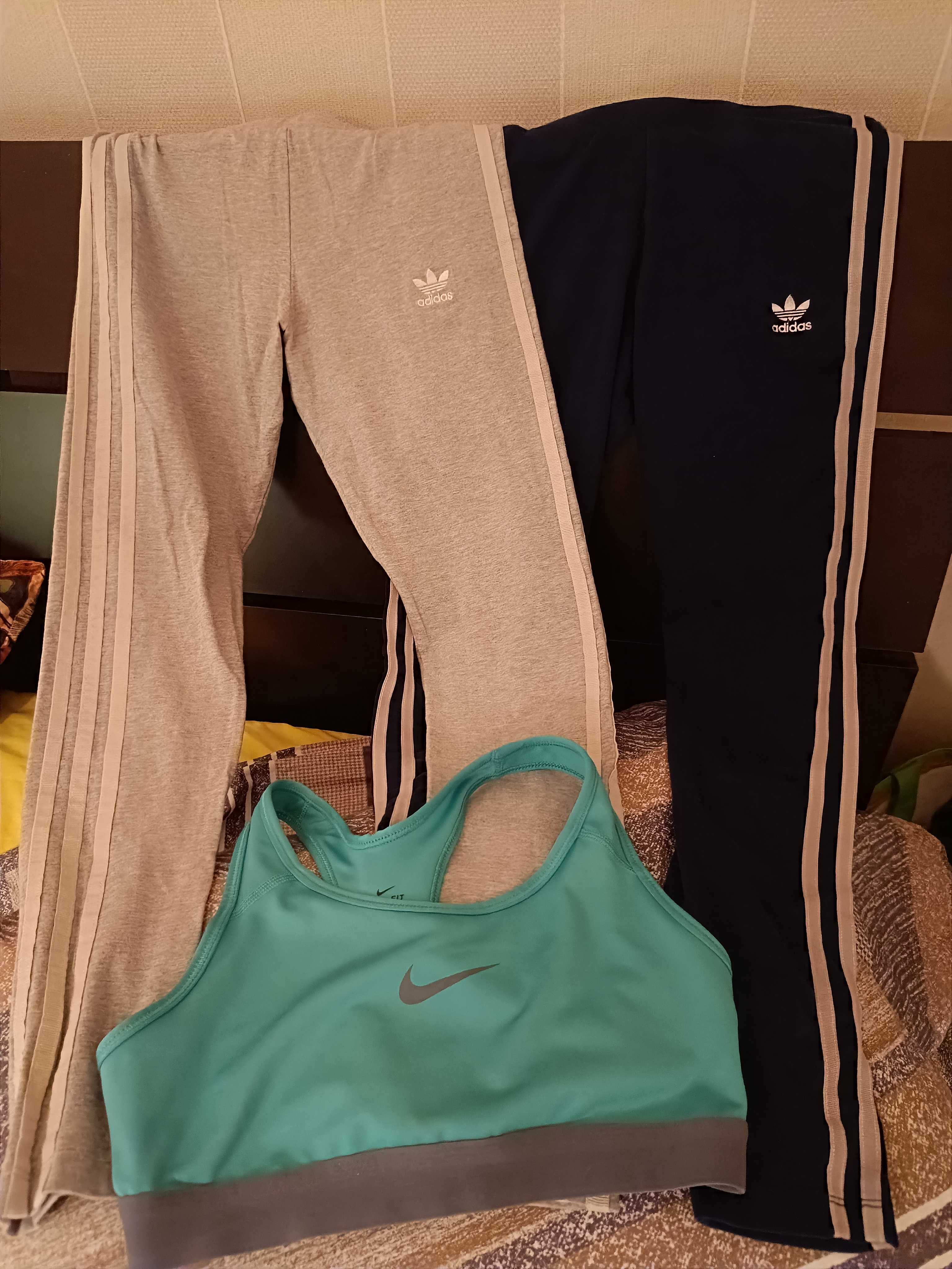 2 calças de fato de treino da Adidas e 1 top de desporto da Nike
