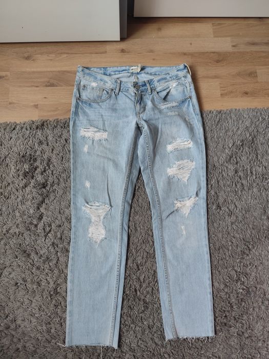 Jeansy damskie z rozdarciami Gina Tricot r. 28/34