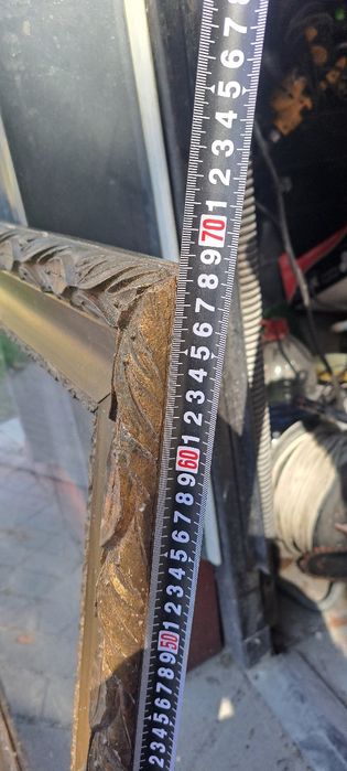 Rama drewniana ze zdobieniami