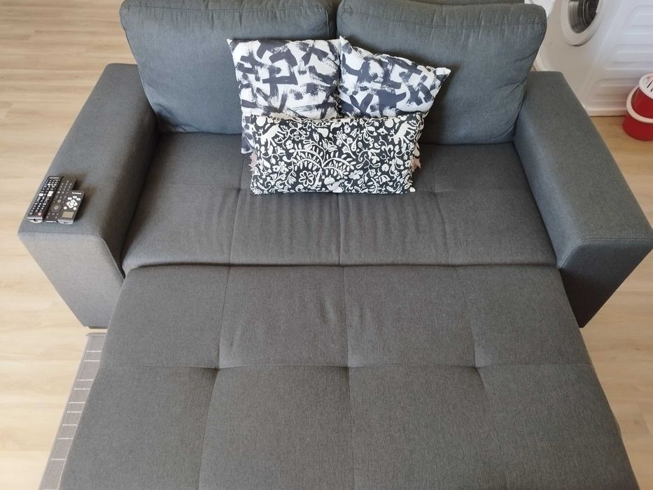 Vendo sofá-cama cinza em bom estado. (1x1,80)