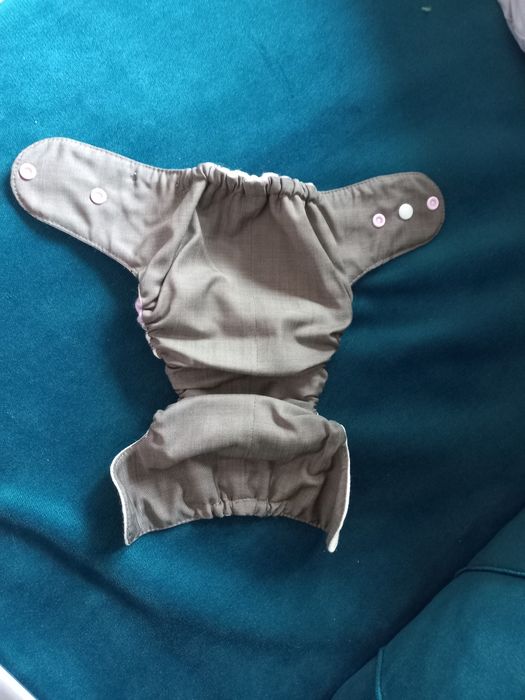 Nowy otulacz wełniany od Szyje Pani na maszynie