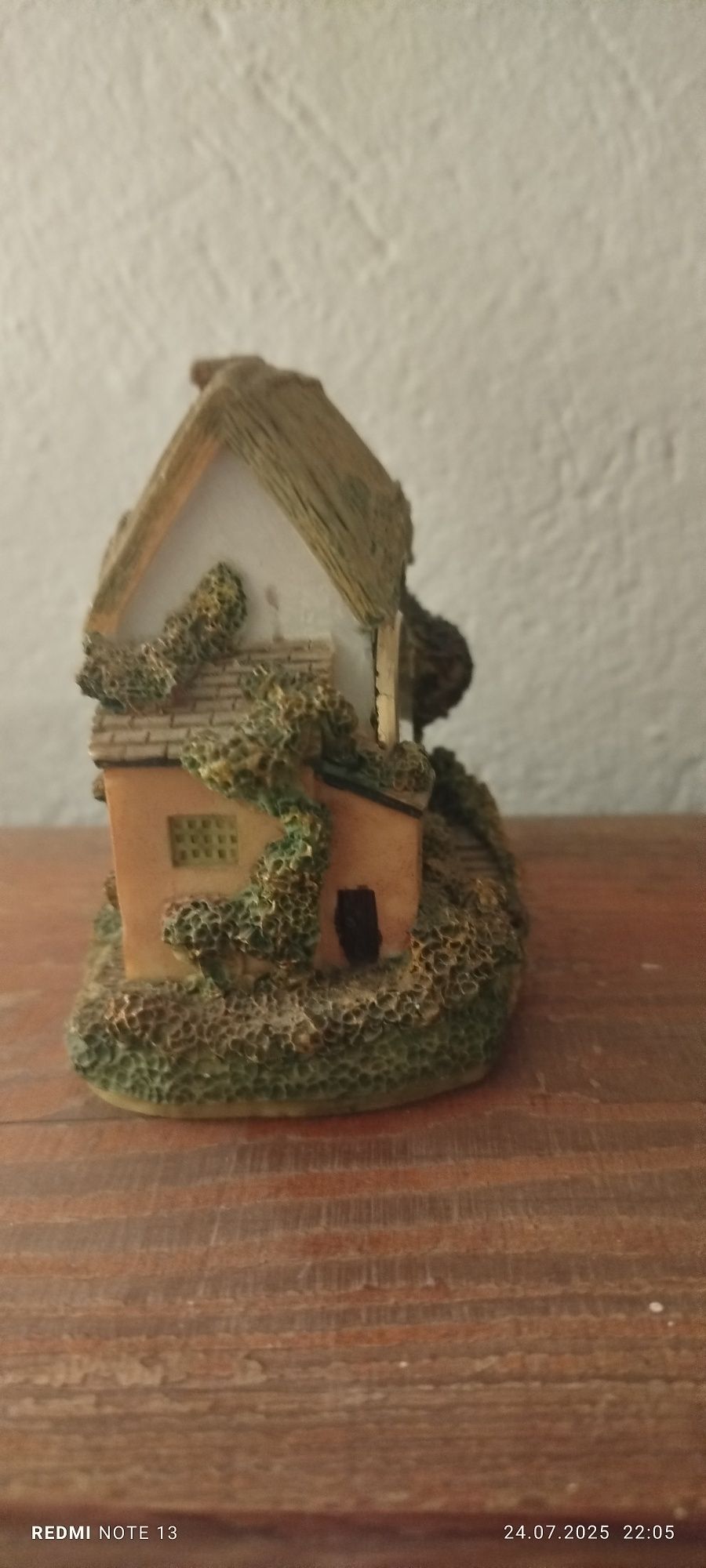 Zegarek w figurce domek