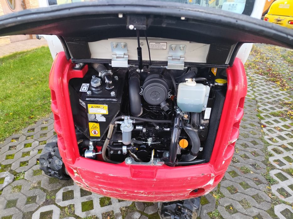 Minikoparka takeuchi Kubota cat jcb