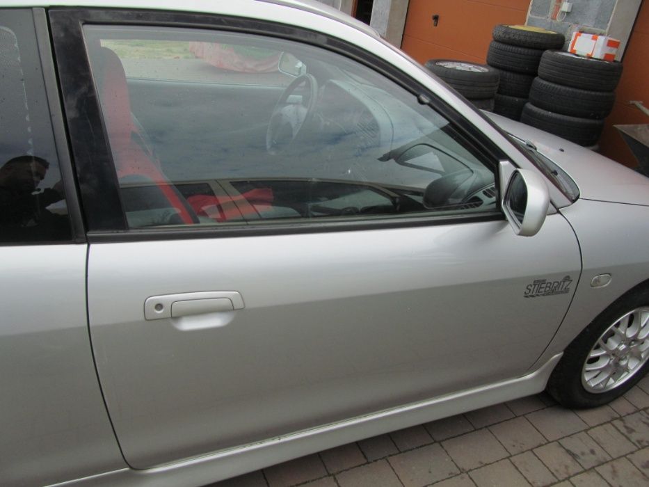 Drzwi prawe lewe Mitsubishi Colt V 5 Cjo Cj0 95-03r A69 Srebrne