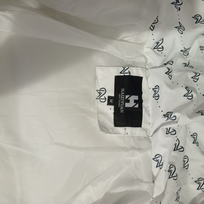 Зимова біла куртка