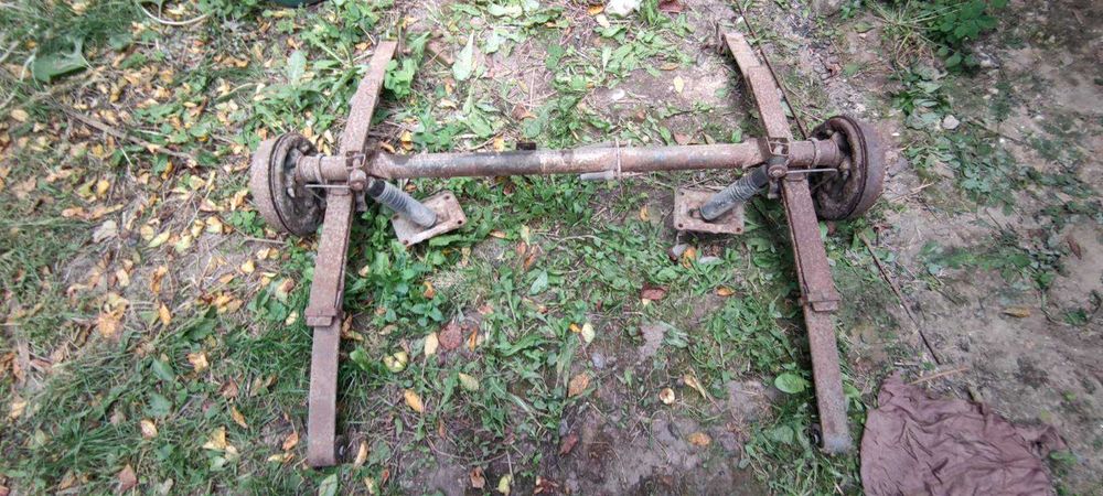 Балка на причеп з ступицями ресорами вісь ступиці прицеп