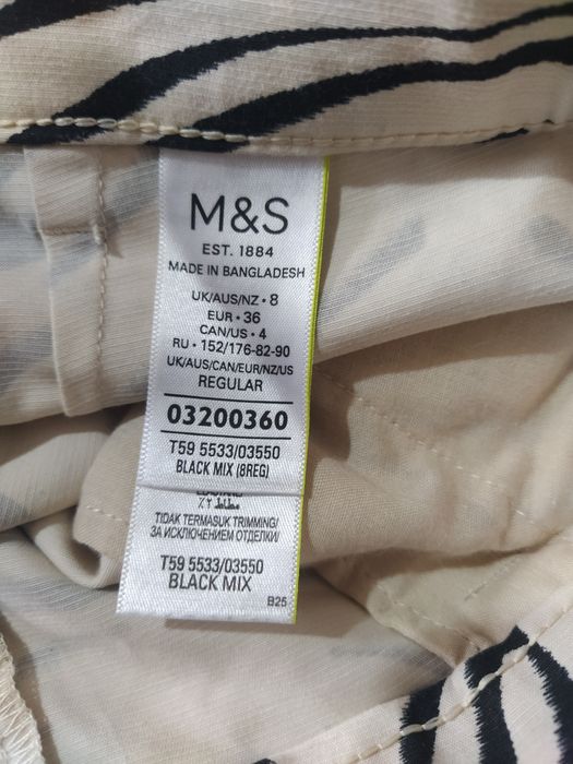 Брюки  в гарно стані . Принт зебра . Фірми  M&S.