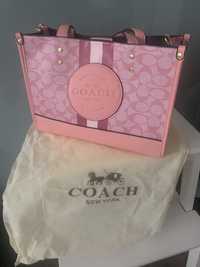 Mala coach cor de rosa