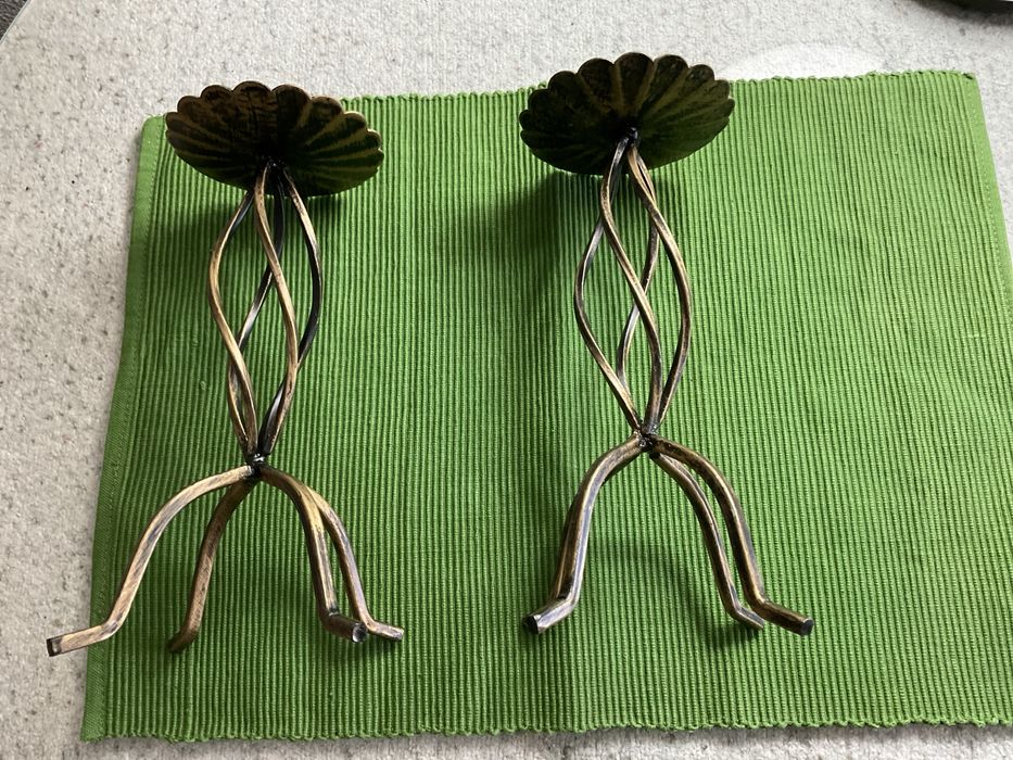 Dois porta velas cor bronze