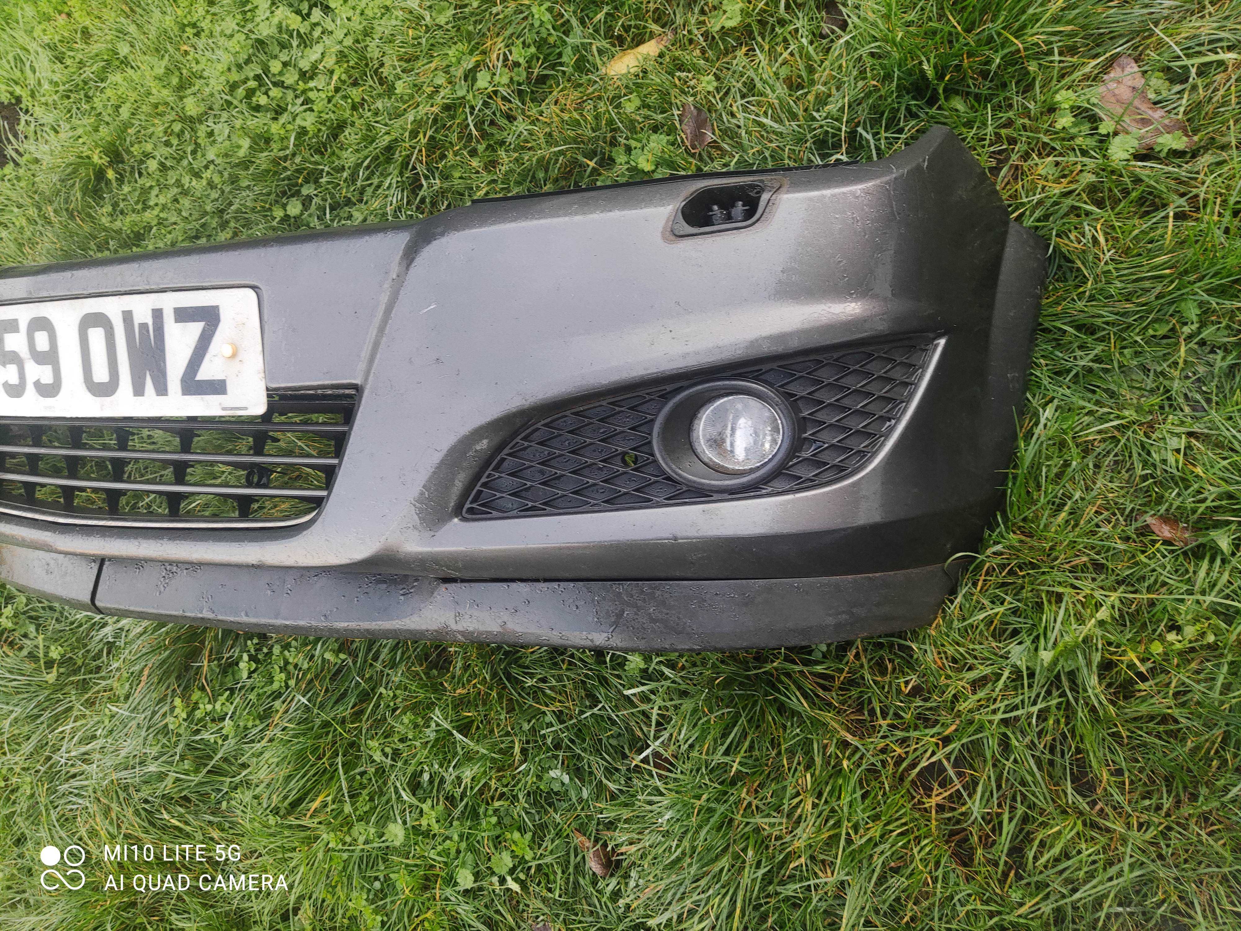 Zderzak przod Opel Astra H spryskiwacze Xenon