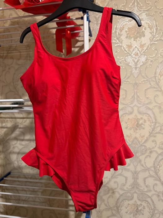 купальники нові