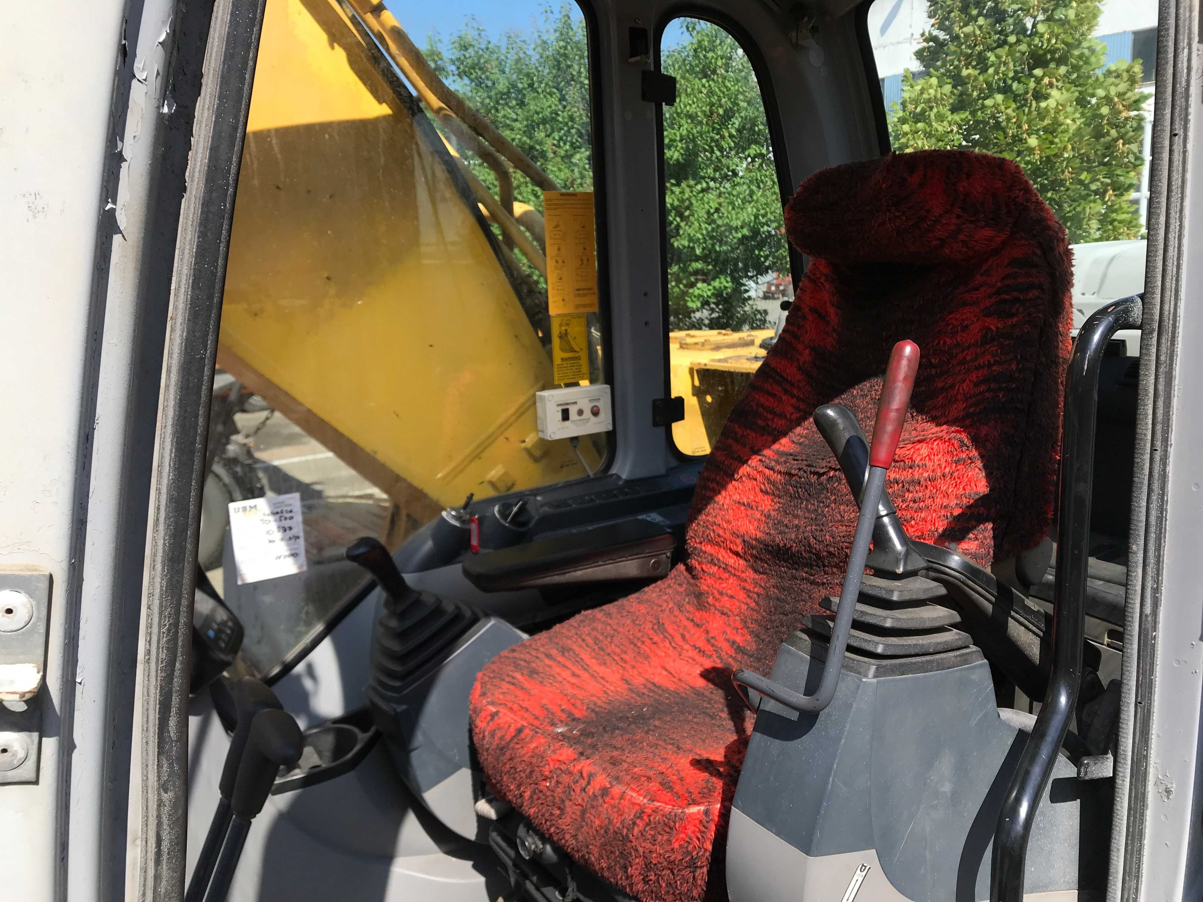 Гусеничний екскаватор NEW HOLLAND E215 Гусеничный экскаватор