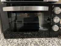 Vendo forno Becken, utilizado uma vez.